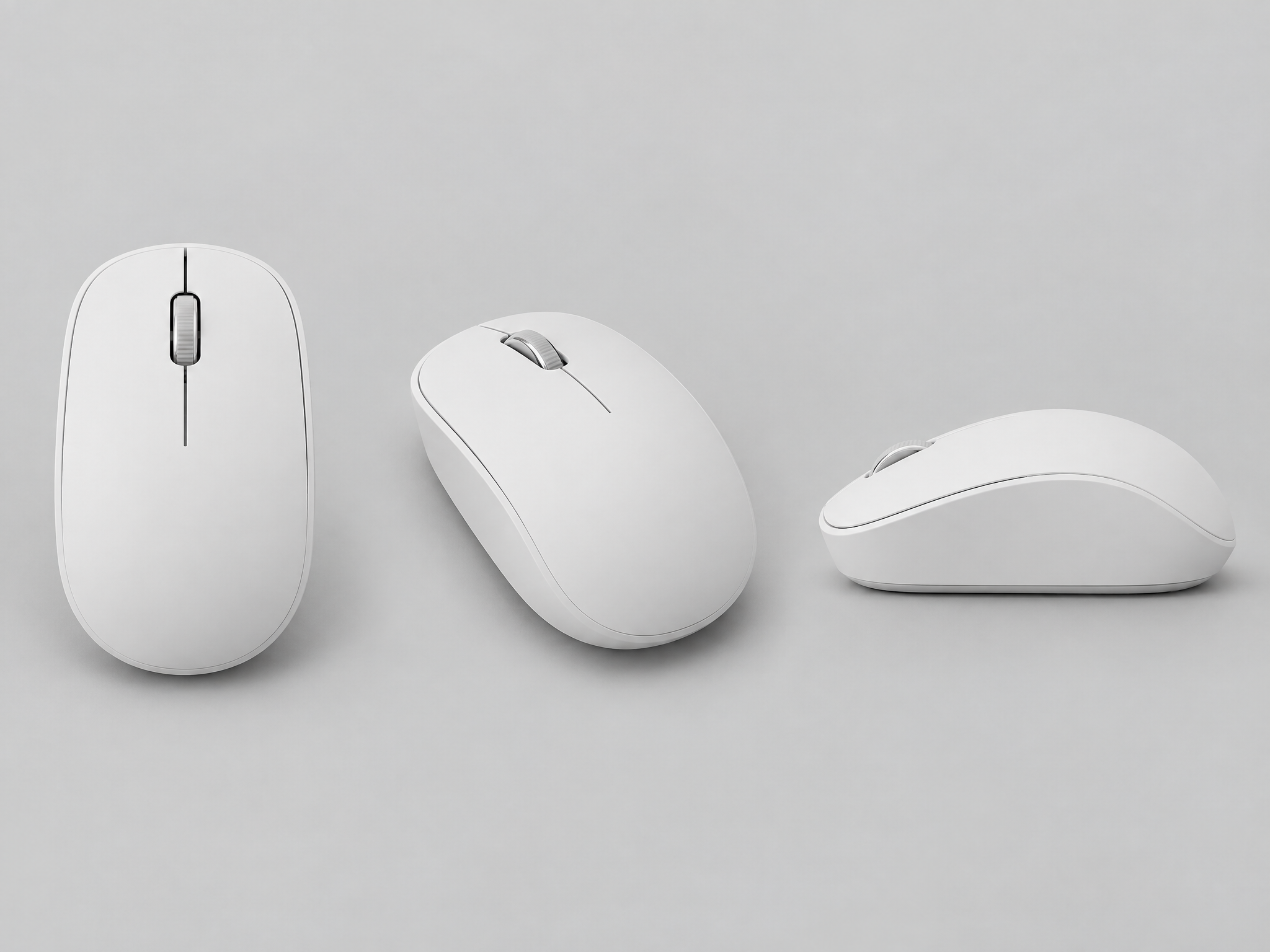 White wireless mouse shown in three angles on one studio product sheet