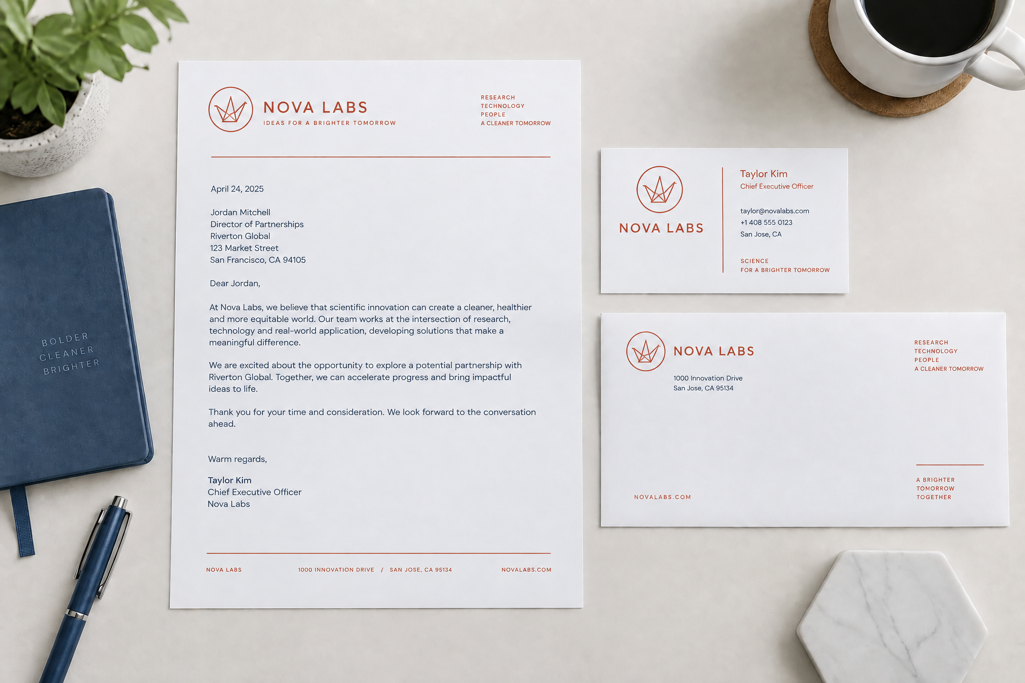 Stationery suite rebranded with an origami crane mark